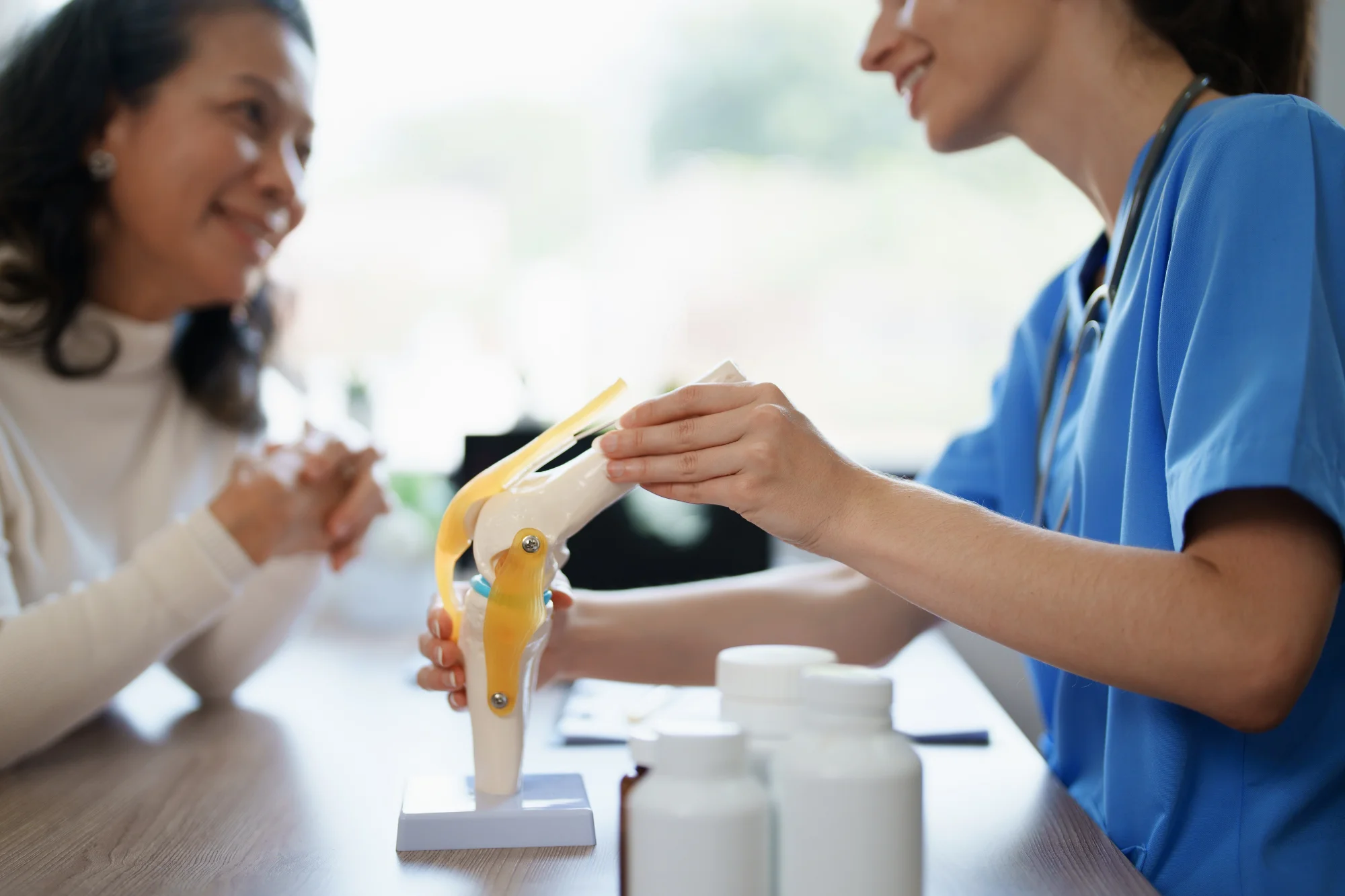 Doctor talking to woman about health